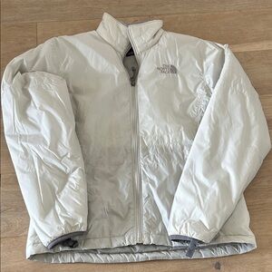 The North Face pale grey/off white windbreaker jacket
